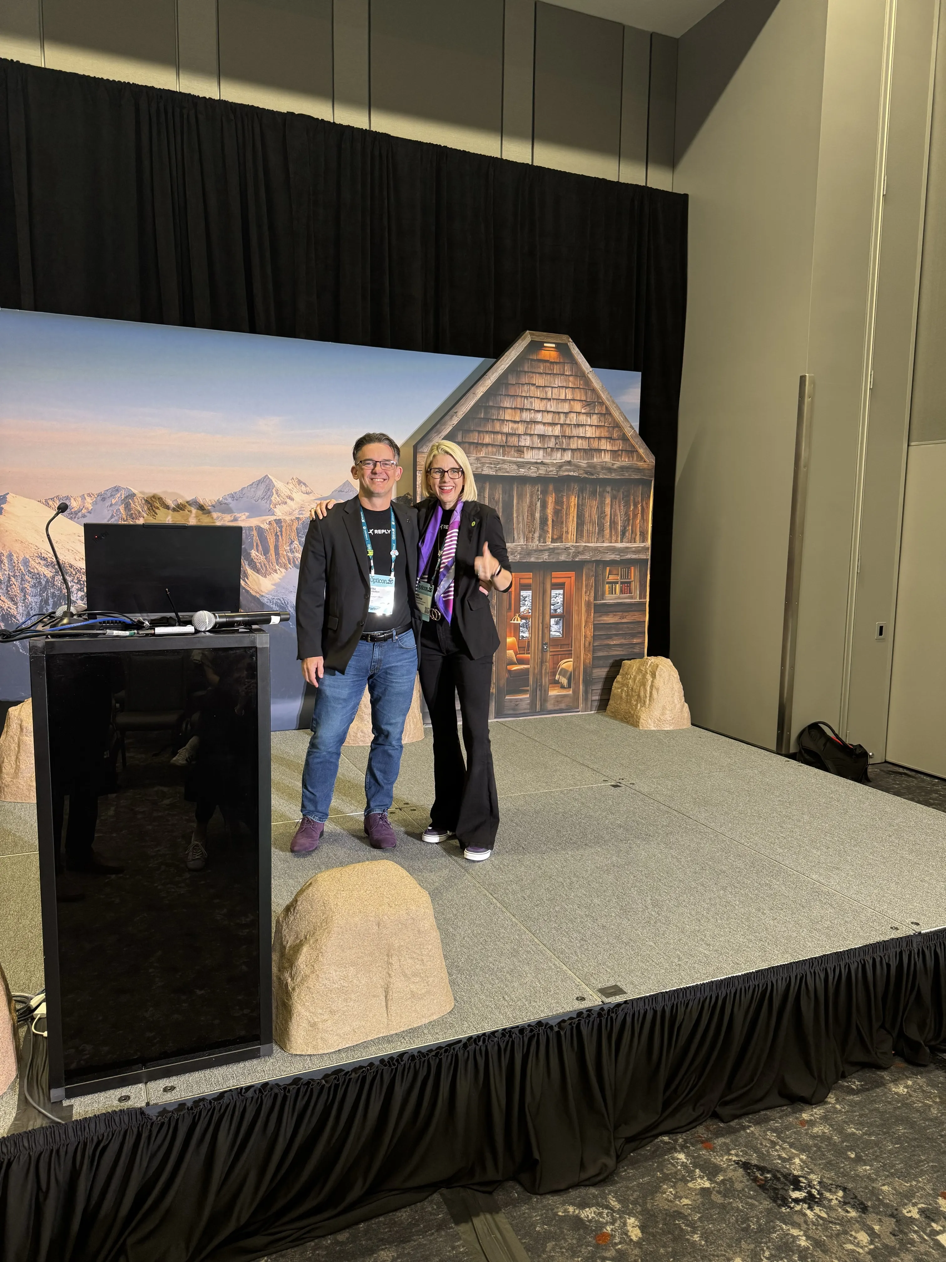 Mike and Ali Smiling Onstage at Opticon 2026