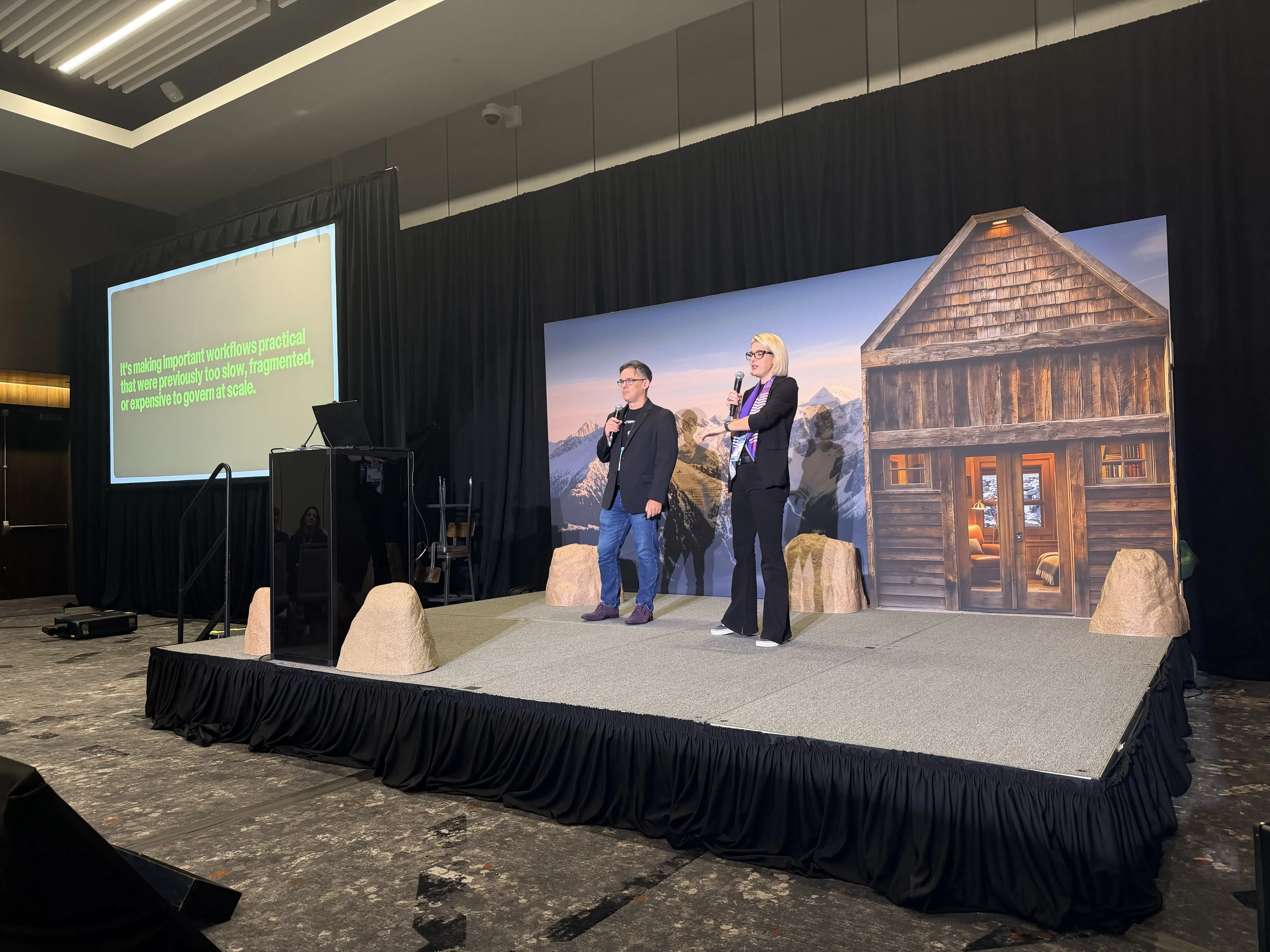 Mike and Ali Presenting On Stage at Opticon 2026