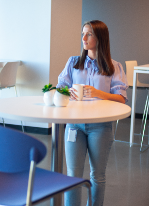 Female engagement manager looking off into the distance