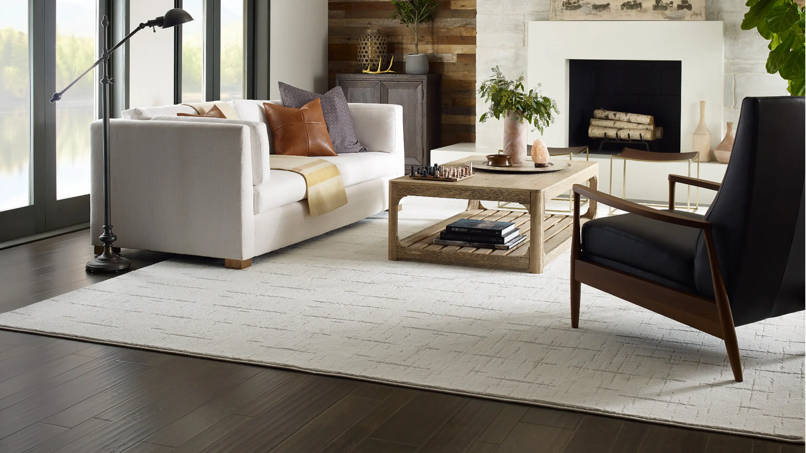 Living room featuring brown hardwood Shaw Flooring